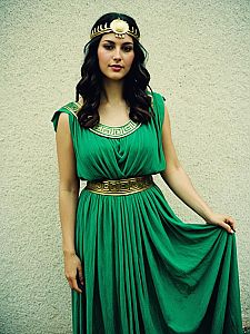Woman Wearing Green Greek Goddess Costume with Gold Accents
