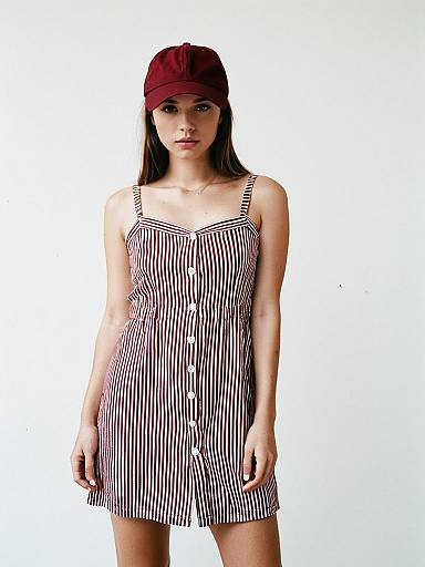 Woman in Casual Red and White Striped Summer Mini Dress with Thin Straps