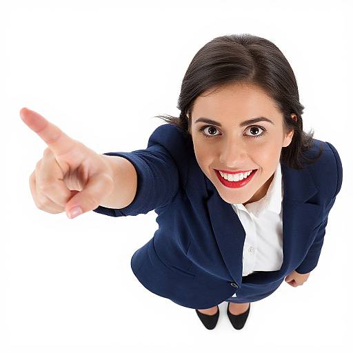 Confident Business Woman Pointing at Camera Wearing Navy Suit