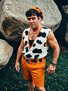 Man in Fred Flintstone Costume Cinematic Realism Detailed Cosplay