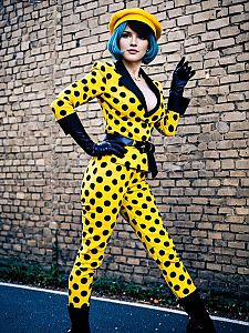 Woman in Yellow Polka Dot Suit with Blue Hair and Beret Fashion Portrait