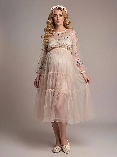 Pregnant Woman in Bohemian Celestial Embroidered Sheer Dress