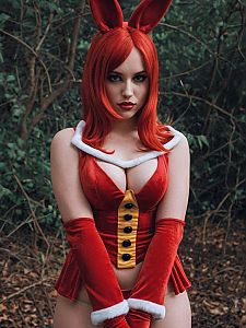 Woman in Festive Red Bunny Costume with Gloves in Forest