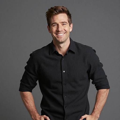 Smiling Young Man in Black Shirt with Casual Pose
