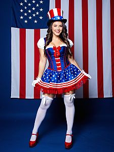 Smiling Woman in Patriotic Costume with American Flag