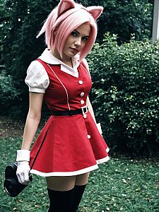 Realistic Amy Rose Archie Cosplay Woman in Red Dress Outdoors