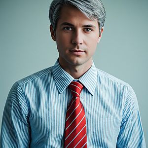 Professional Man in Blue Striped Shirt and Red Tie Portrait