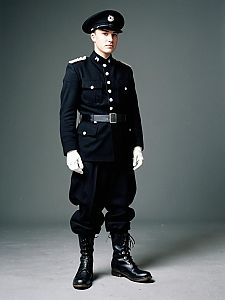 Young Man in Traditional Black Ceremonial Military Uniform Portrait