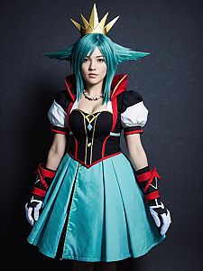 Woman in Aqua Kingdom Hearts Cosplay Costume with Turquoise Hair and Golden Crown