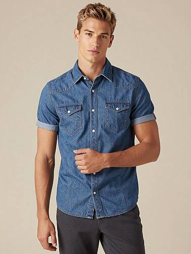 Young Man Wearing Stylish Short-Sleeve Denim Shirt