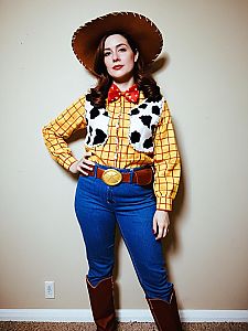 Woman in Classic Western Cowboy Costume with Hat and Boots