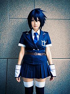 Woman in Realistic Mukuro Ikusaba Cosplay Costume with Navy Blue School Uniform
