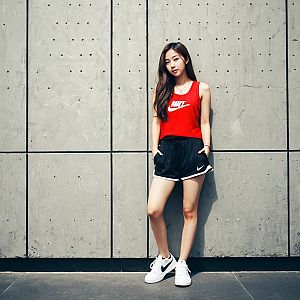 Confident Young Woman in Sporty Outfit