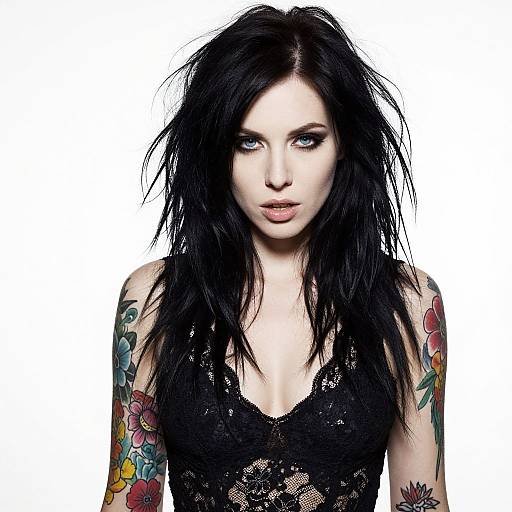 Edgy Woman with Floral Tattoos in Black Lace Top