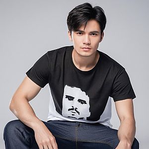 Young Man in Black and White Graphic Tee