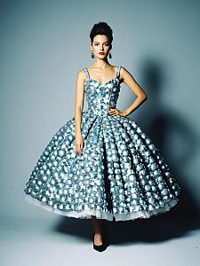 Woman in Mini Silver Ball Gown Full Body Editorial Fashion Photo