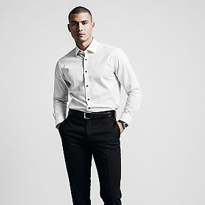Confident Man in White Shirt and Black Pants