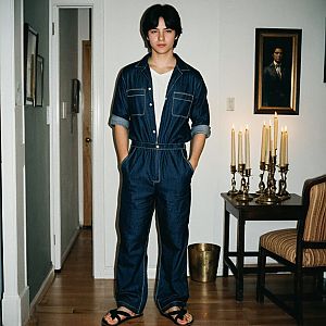 Confident Young Man in Vintage Hallway