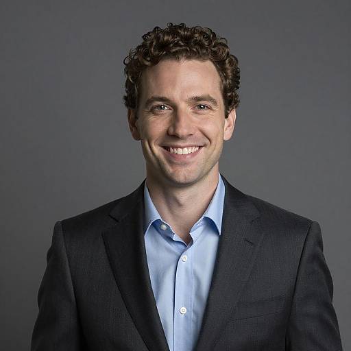 Professional Portrait of Smiling Man in Suit Curly Hair