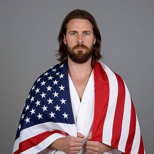 Man in Martial Arts Uniform Wrapped in American Flag