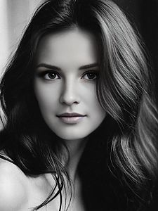 Black and White Realistic Portrait of Young Woman with Flowing Hair