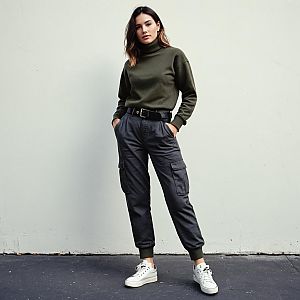 Stylish Woman in Olive Green Turtleneck and Cargo Pants Casual Streetwear
