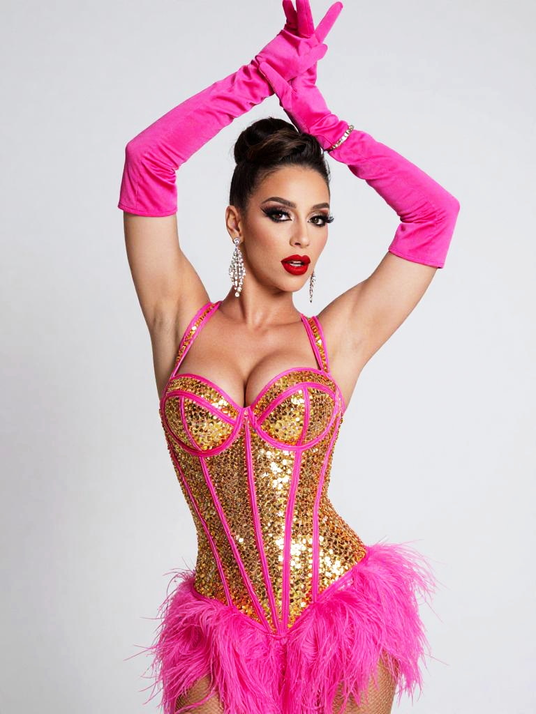 Glamorous Woman in Gold Sequin Corset and Pink Feather Skirt with Long Gloves