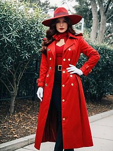 Elegant Woman in Red Trench Coat and Wide-Brimmed Hat Outdoors