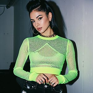 Trendy Woman in Neon Green Fishnet Crop Top Stylish Urban Fashion