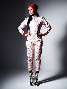 Retro Futuristic Pink Jumpsuit with Metallic Silver Dots on Woman