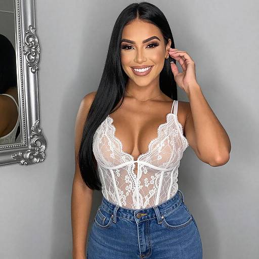 Woman Wearing White Lace Bodysuit and High Waist Jeans Fashion Portrait