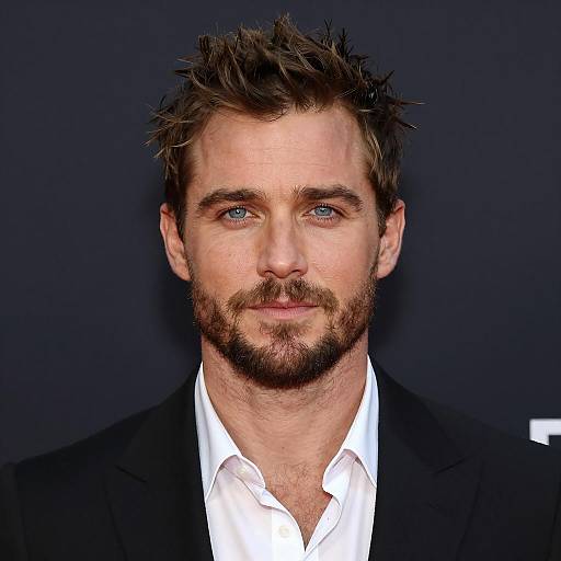 Portrait of Confident Man with Blue Eyes and Rugged Beard in Formal Attire