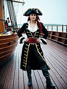 Woman in Pirate Costume Full Body Cosplay Photo on Ship Deck
