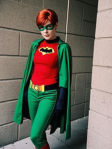 Man in Realistic Carrie Kelley Cosplay Costume Inspired by Batman