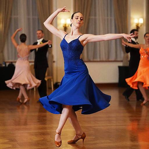 Woman in Elegant Blue Ballroom Dress Dancing in Ballroom