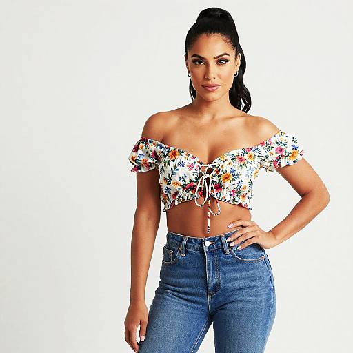 Woman Wearing Floral Off-Shoulder Crop Top and High Waisted Jeans