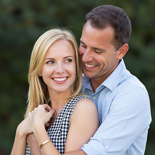 Happy Couple Embracing Outdoors in Casual Attire