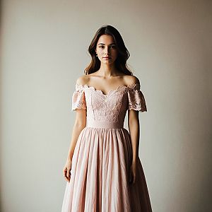 Young Woman in Blush Pink Off-Shoulder Lace Dress