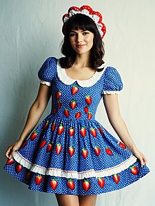 Woman Wearing Blue Polka Dot Dress with Strawberry Print and Matching Ruffled Headband