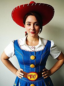 Woman in Realistic Jessie Toy Story Costume with Red Cowboy Hat