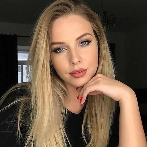 Close-up Portrait of Blonde Woman with Red Lipstick and Manicure