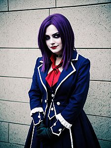Facilier Female Cosplay with Purple Hair and Gothic Outfit