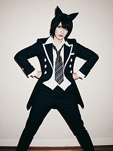 Man in Stylish Femboy Costume with Cat Ears Fashion Cosplay