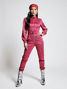 Retro Futuristic Pink Jumpsuit with Metallic Silver Dots on Woman