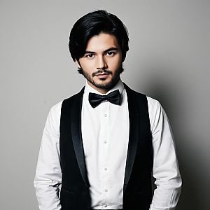 Young Man in Black Vest and Bow Tie Realistic Portrait