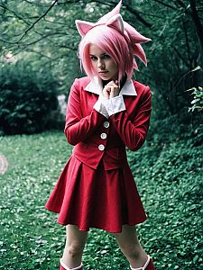 Woman in Realistic Amy Rose Cosplay Costume Outdoor Photo