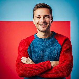 Cheerful man in a colorful sweater
