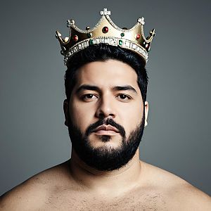 Confident Man in Ornate Gold Crown