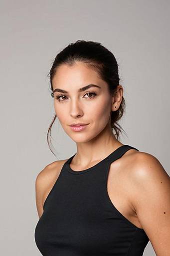Portrait of Confident Young Woman in Black Sleeveless Top