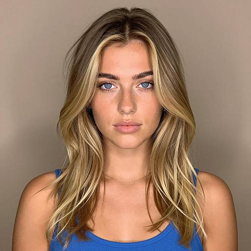 Close-Up Portrait of Blonde Woman with Blue Eyes and Natural Makeup